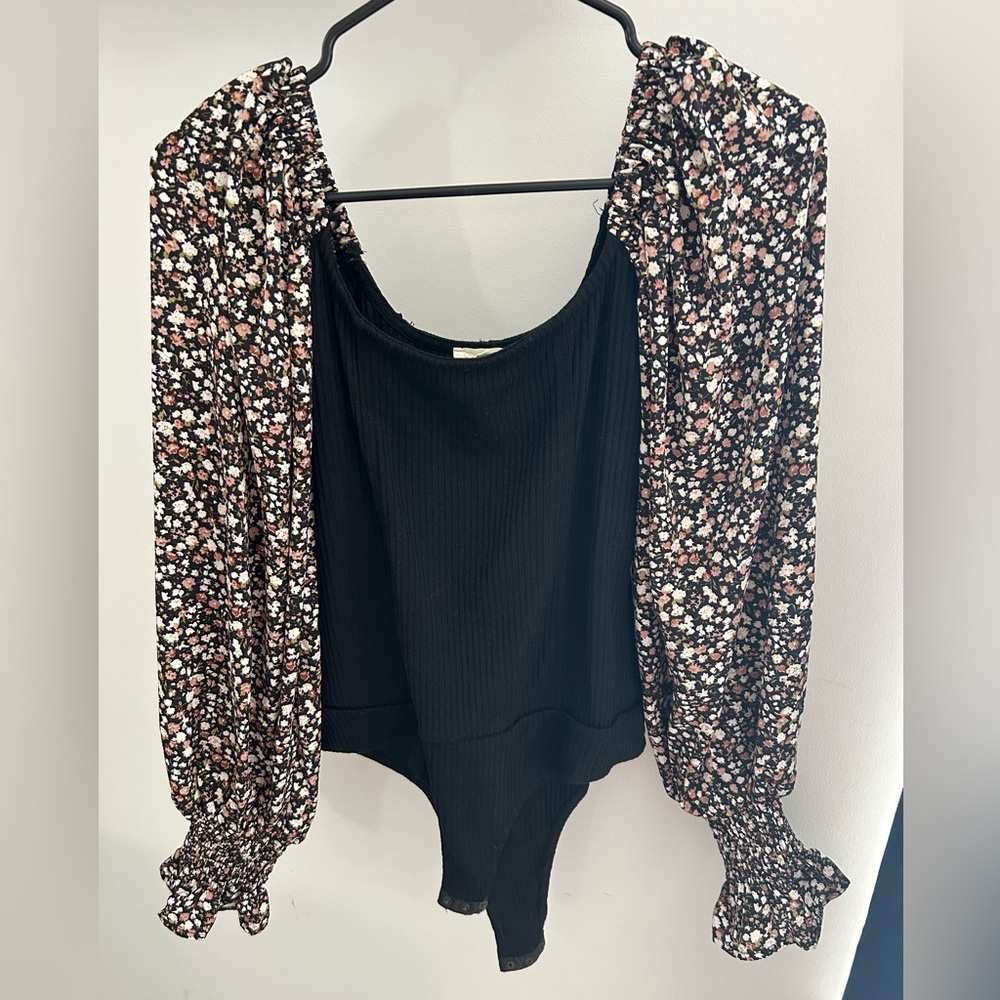 Excellent condition, worn once, bodysuit, that is off the shoulders